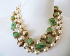 Chanel necklace with faux pearls and jade Gripoix flowers and balls sign. 1991