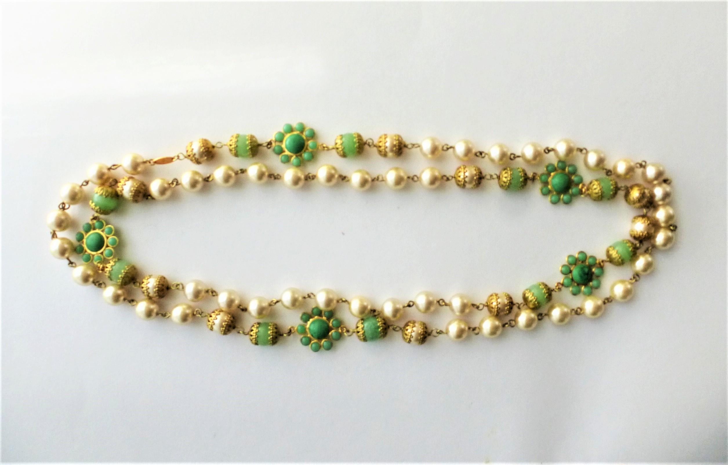 Round Cut Chanel necklace with faux pearls and jade Gripoix flowers and balls sign. 1991 