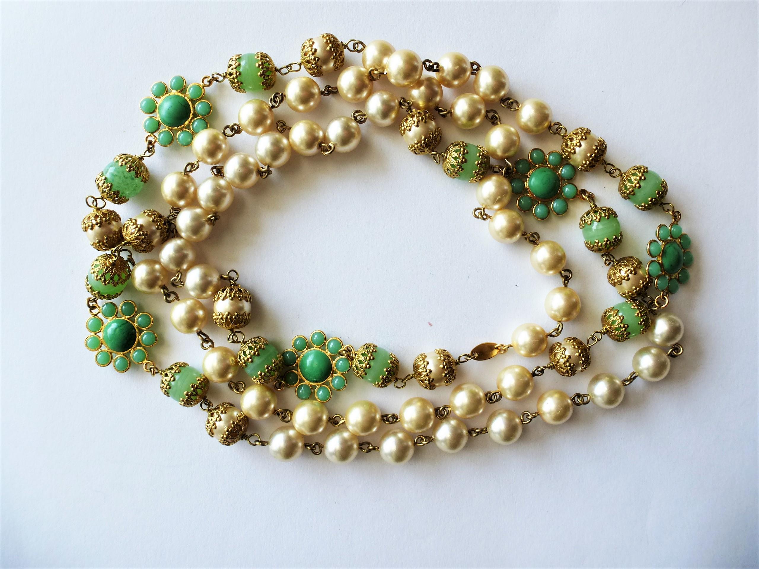 Women's Chanel necklace with faux pearls and jade Gripoix flowers and balls sign. 1991 