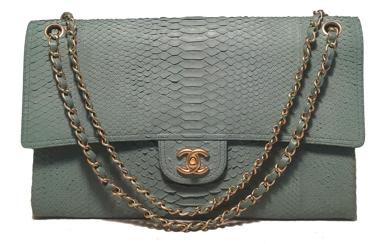 Chanel Seafoam Python Snakeskin Classic Flap in excellent condition. Pale sea foam green python snakeskin exterior trimmed with matte gold hardware. Woven chain and leather shoulder strap can be worn short or long to suit any style. Front CC logo