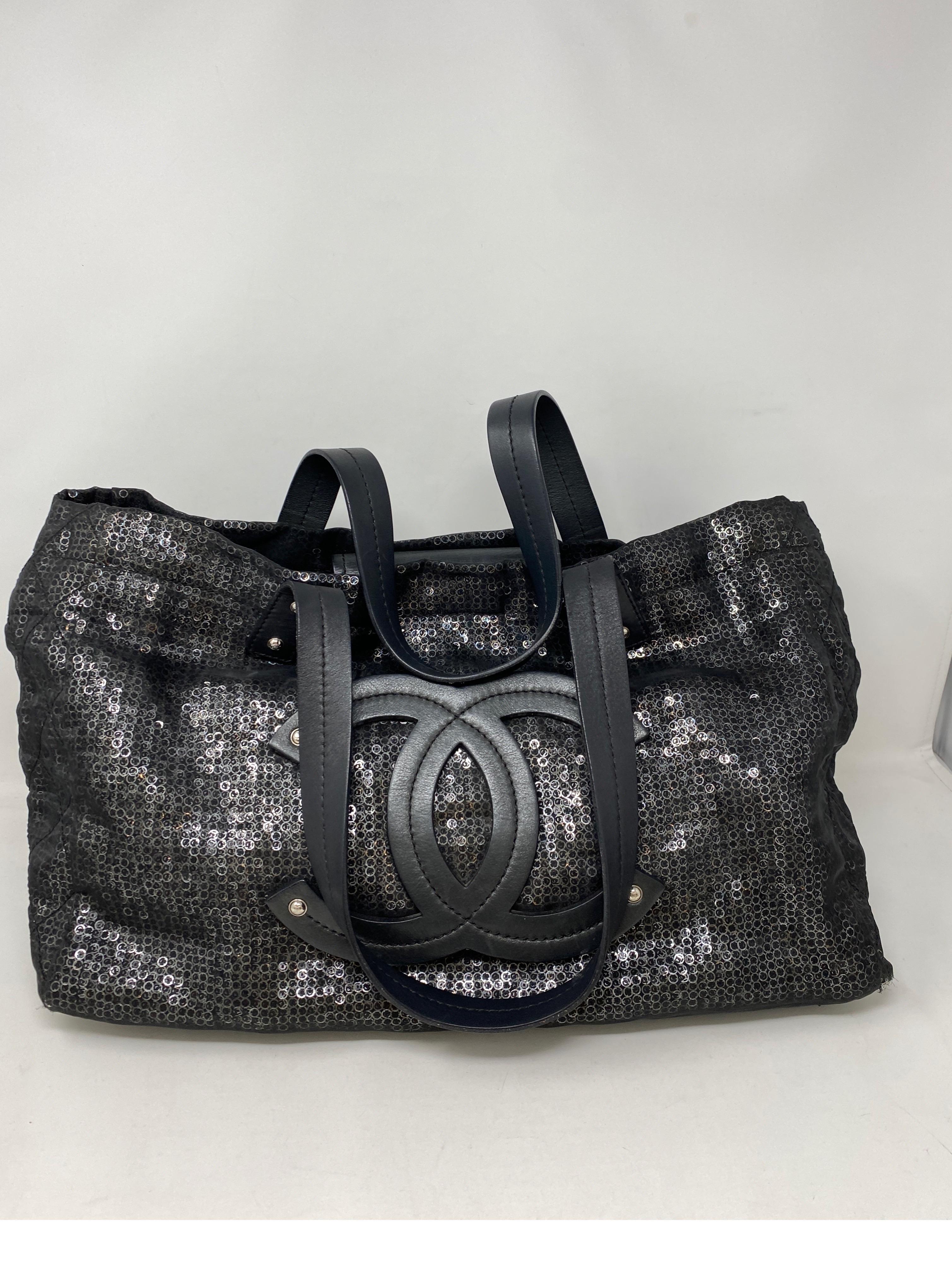 Chanel Sequin Black Tote Bag. Excellent condition. Unique style Chanel bag. Lightweight and can hold quite a bit. Guaranteed authentic. 