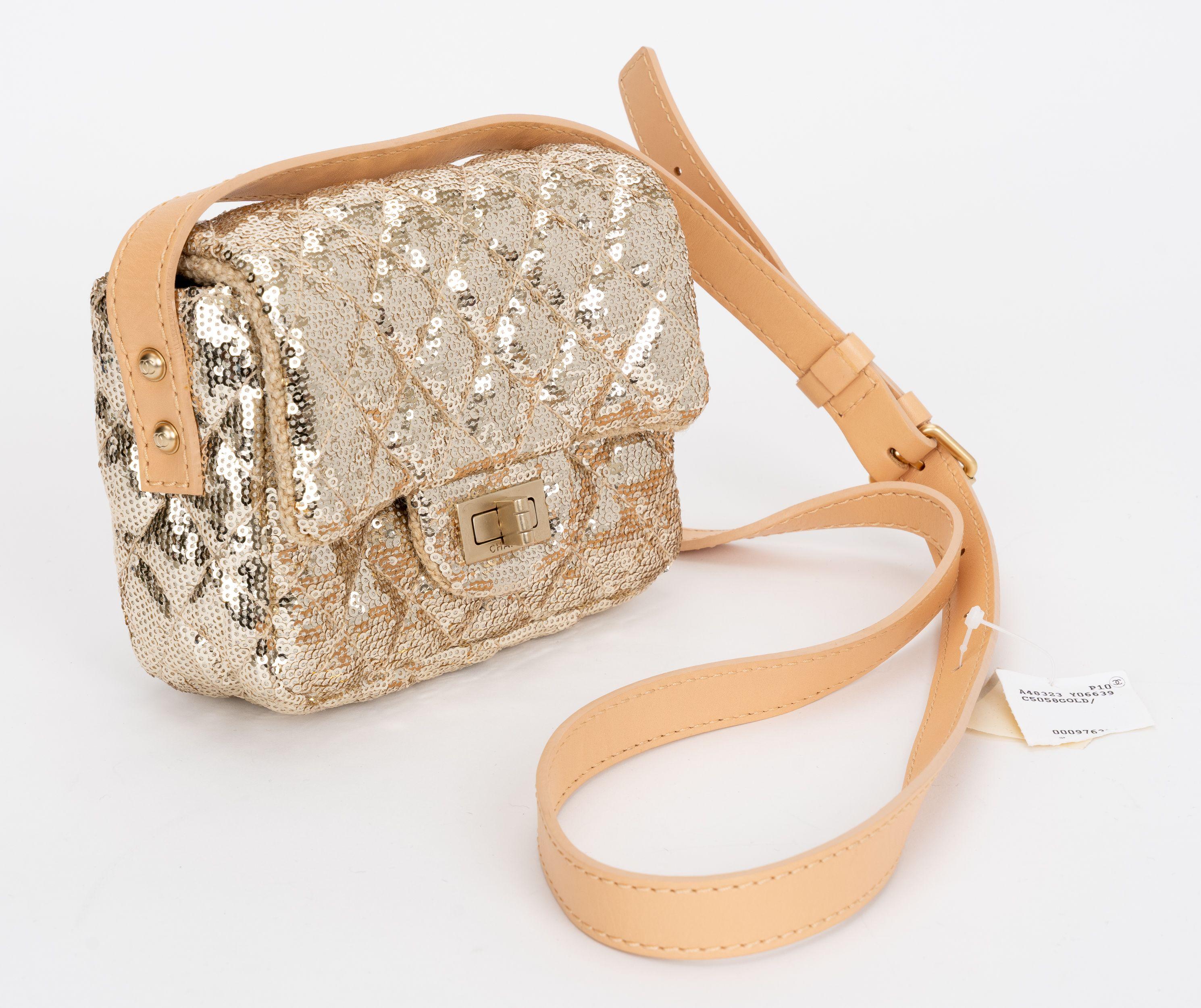 Chanel Mini Easy Sequin Reissue Flap Bag from the Spring 2010 Collection by Karl Lagerfeld. Sequins with antiqued gold tone hardware. Single adjustable shoulder strap. Features a twill interior lining and a single interior pocket. Turn lock