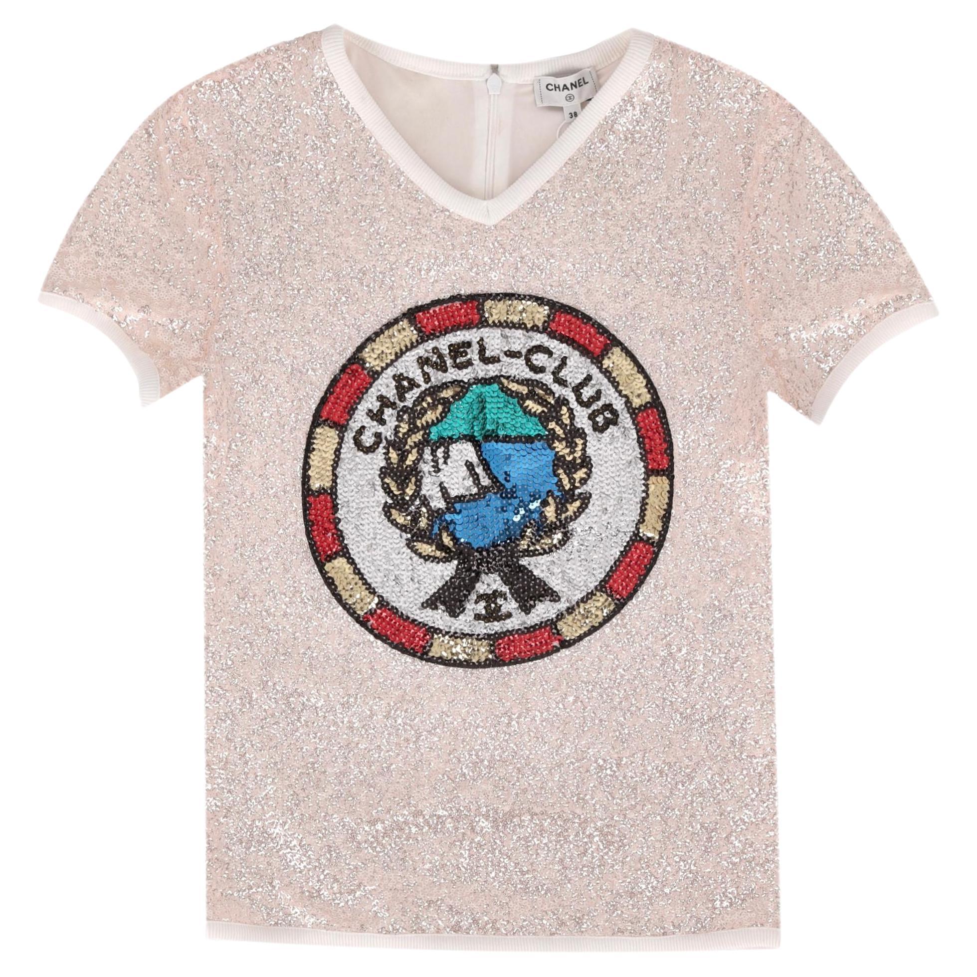 Top con paillettes Chanel con logo