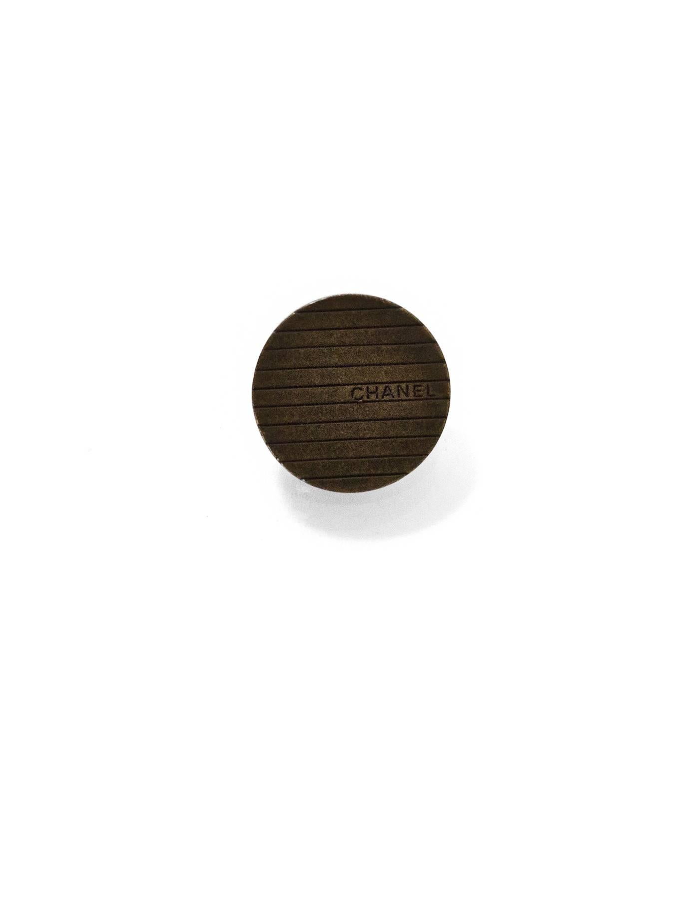 Chanel Brasstone Stripe Buttons
Features set of six 18mm buttons

Color: Brass
Hardware: Brasstone
Materials: Metal
Overall Condition: Excellent good pre-owned condition, light surface marks

Measurements: 
Diameter: 18mm