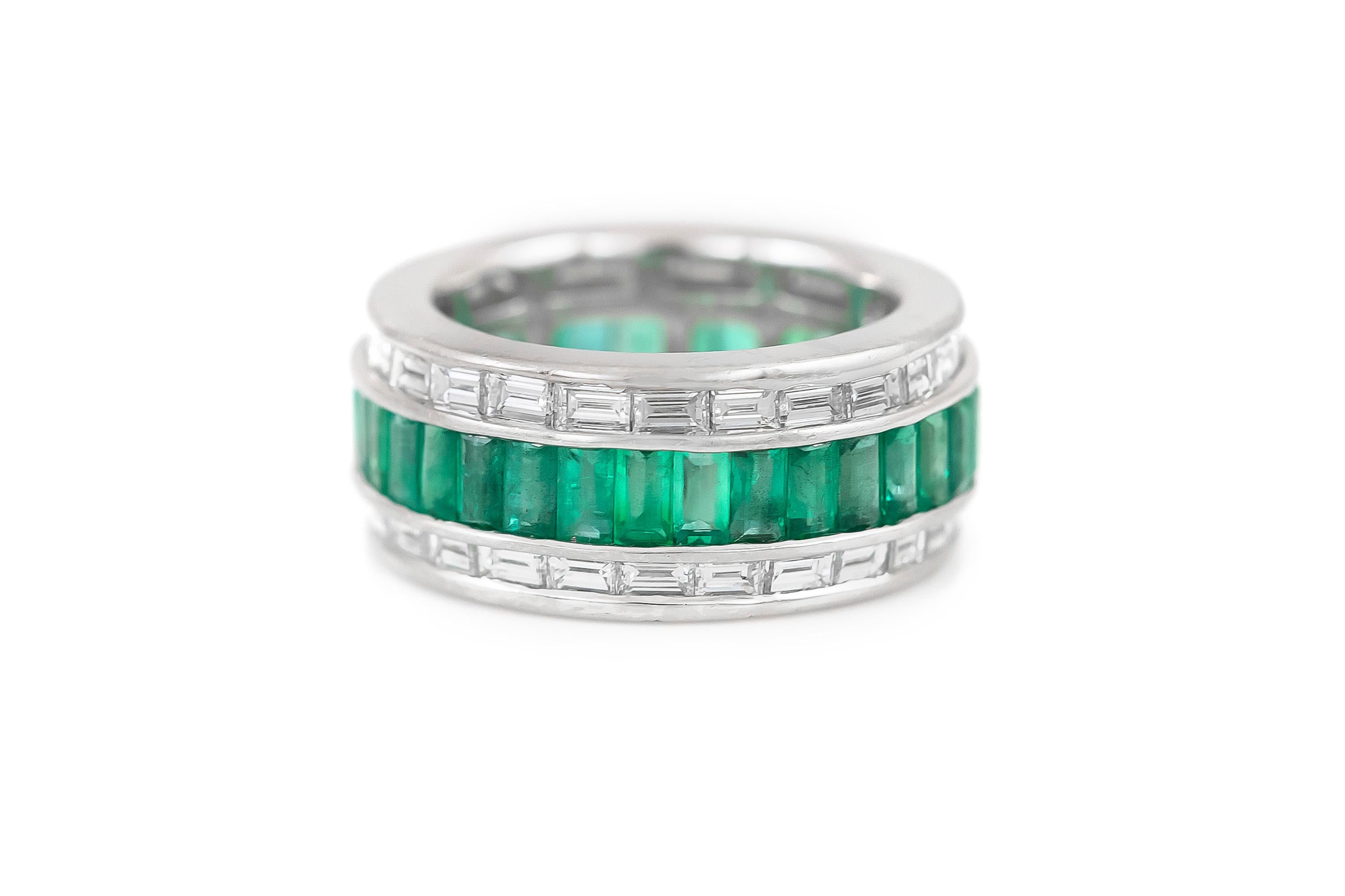 The ring is finely crafted in platinum with diamonds weighing approximately total of 3.00 carat and emeralds weighing approximately total of 4.03 carat.
Circa 1940.