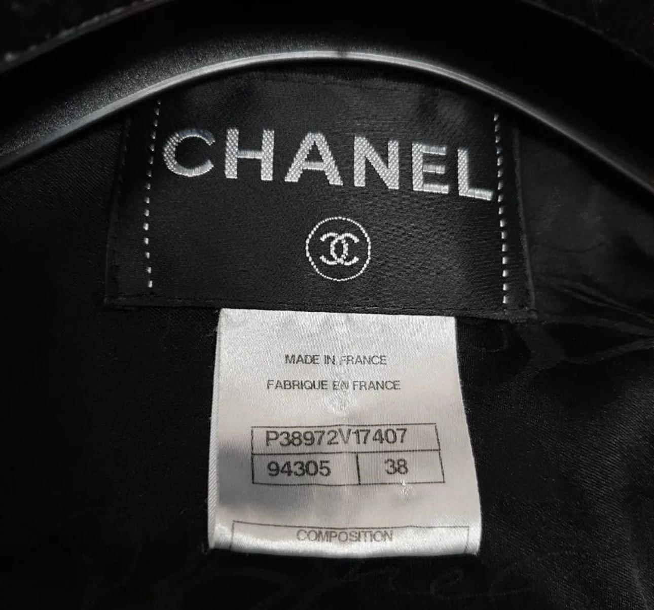CHANEL Paris Shanghai Velvet Quilted Zip Up Jacket with Corset 
size 38 US size 6 or Size small 

Preowned but in good condition.
Has some abrasion seen on photos.

Details
From the Pre-Fall 2010 Metiers d'Art Collection. 
Black Chanel velvet jacket