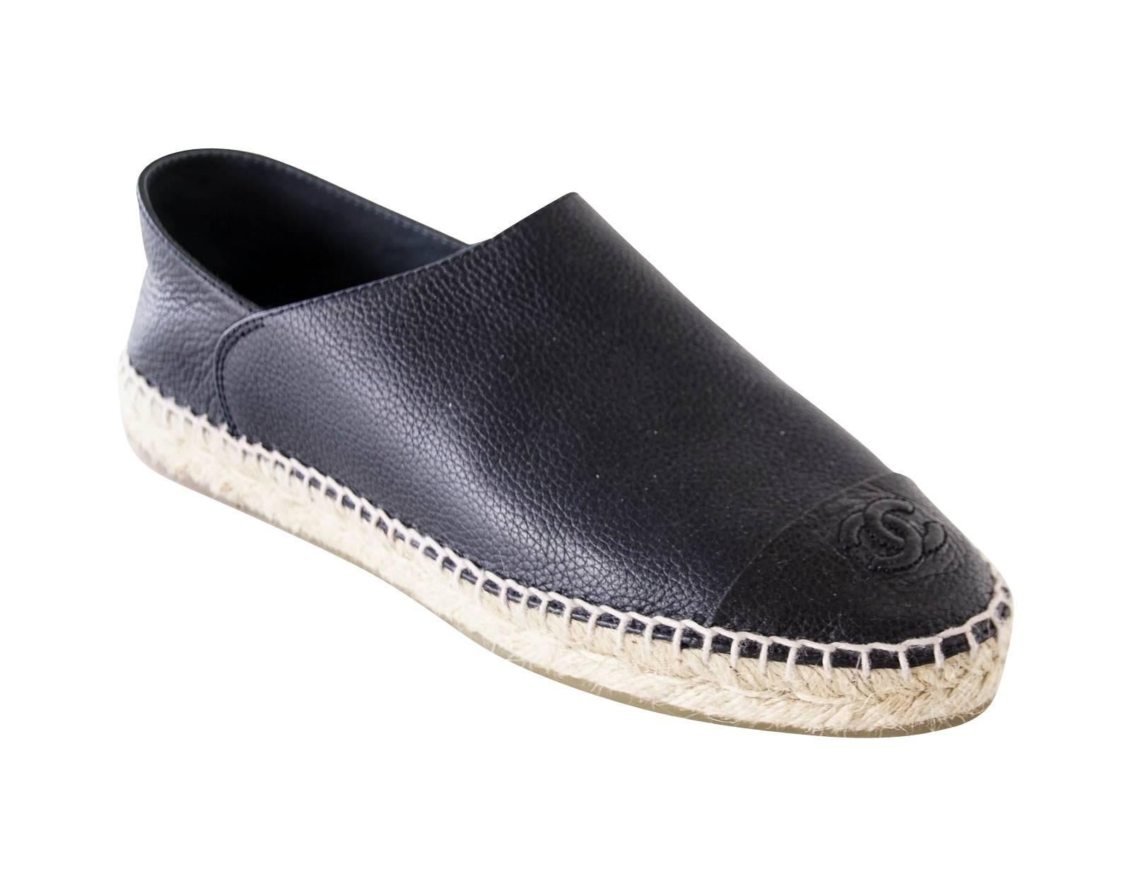 Chanel Espadrilles Cambon loafers in soft very dark navy leather.  
CC on toe caps. 
Very rare to find also worn as a slide.
Worn one time.  Heel resoled for protection.
final sale

SIZE 39
USA SIZE 9

SHOE MEASURES:
HEEL  1