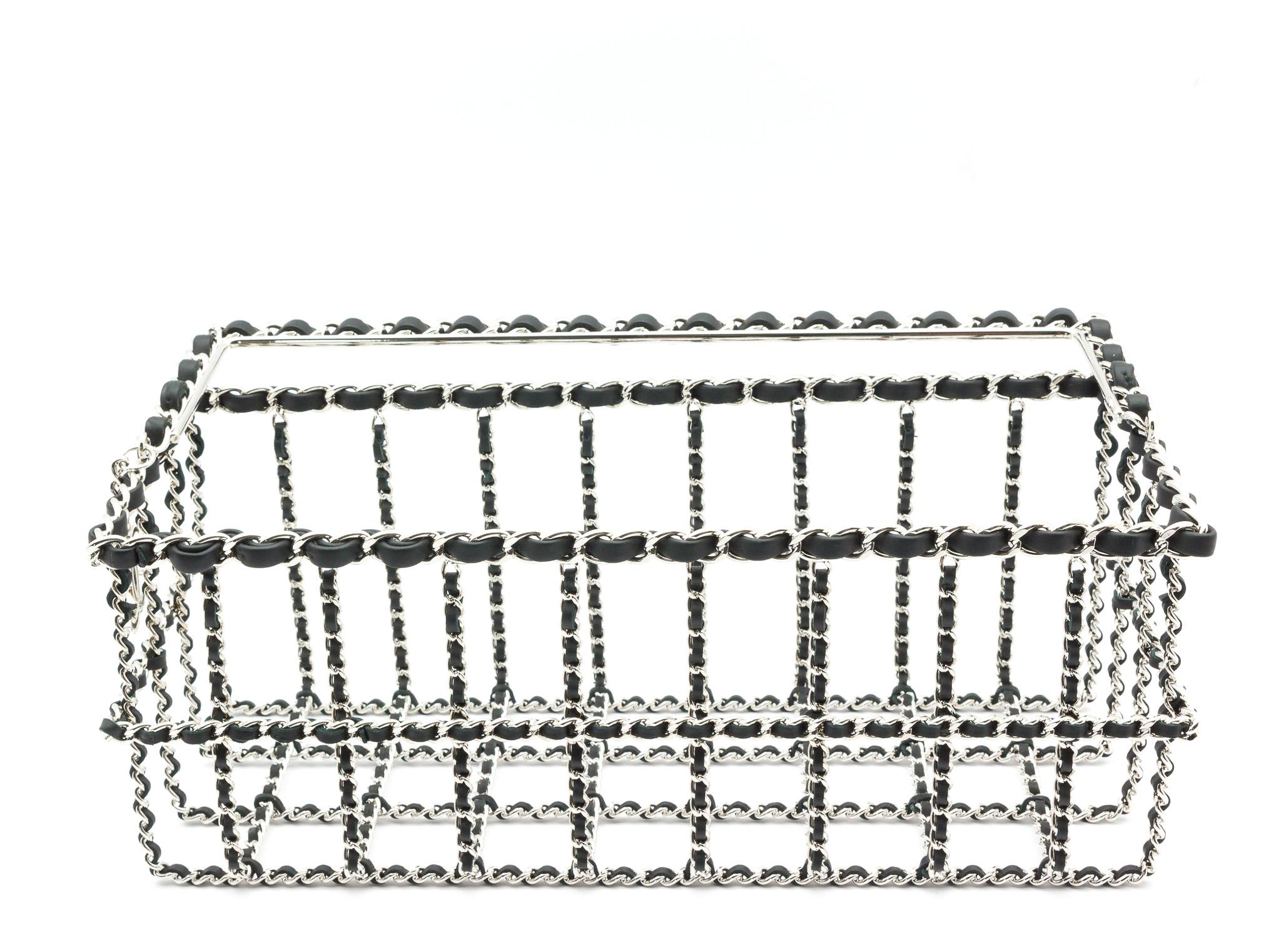 Rare and collectable Chanel Small Shopping basket handbag, silver plated metal and black calf leather. The theme for the Fall Winter 2014 Collection was ‘supermarket’, this Chanel Basket Bag is one of the most creative and fun bags made for this