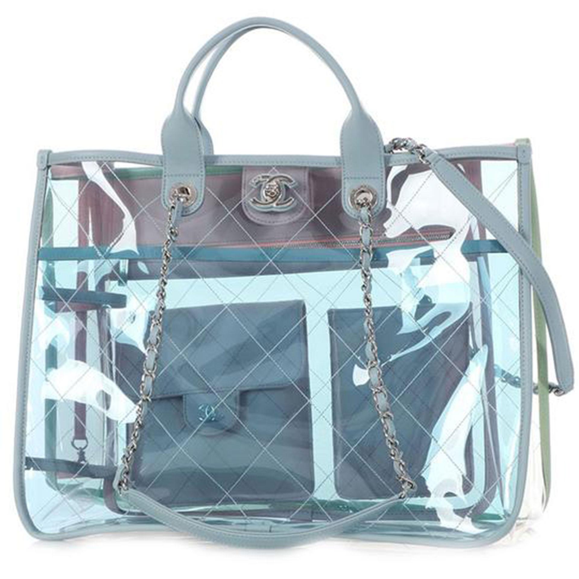 Coco Chanel Transparent Clear Shopping Tote Quilted PVC Lambskin

Year: 2019 
Silver hardware

Transparent blue, green, & clear PVC 
Tonal leather lining 
Leather top handles 
Handle drop: 4