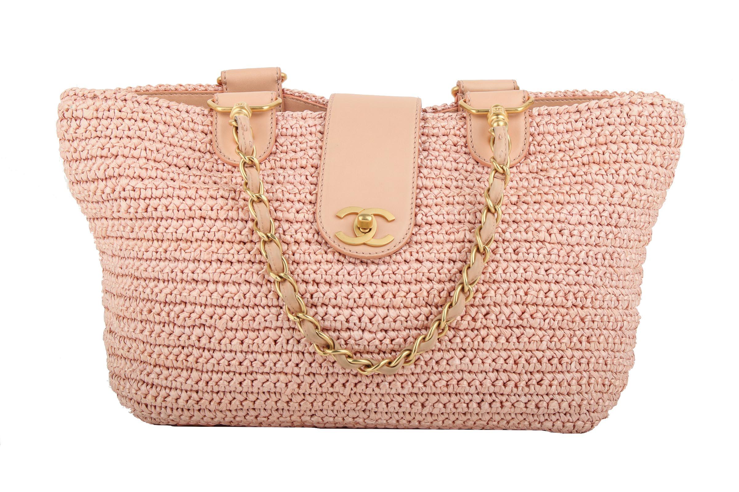 Chanel 2005 Rare Vintage Raffia Woven Pink Straw and Leather Basket Tote

2005 {VINTAGE 18 Years}
Brushed gold hardware
Woven pink raffia straw
Classic interwoven chain
CC Classic Turnlock
CC pink logo fabric interior 
Interior zippered pocket