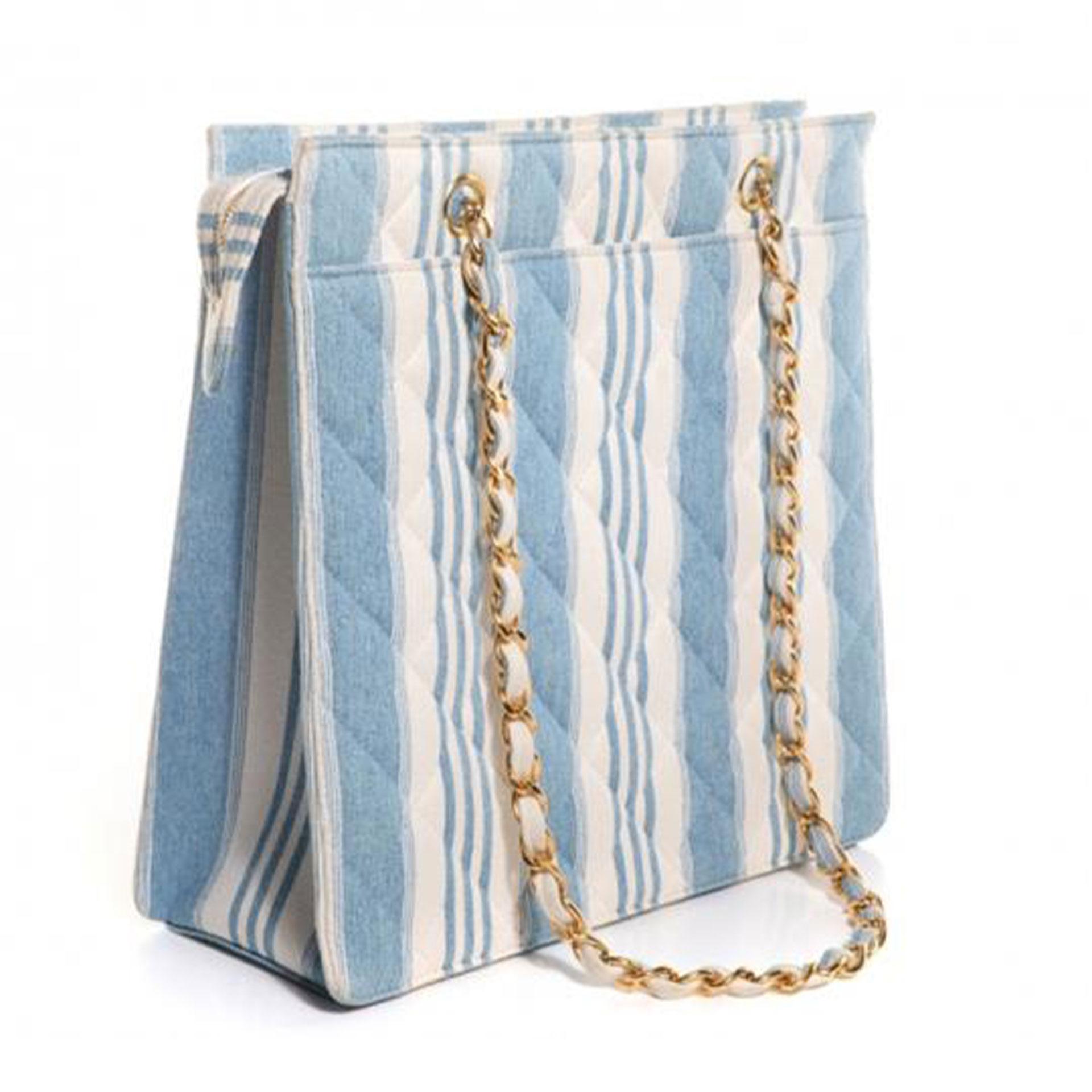 Chanel Vintage 90s Mini Striped Light Blue Denim Tote Shoulder Bag Shopping Tote

1997 {VINTAGE 25 Years}
Gold hardware
Double handle chain
Quilted jean denim striped blue and white
Zippered main compartment
Leather lined interior
Main interior