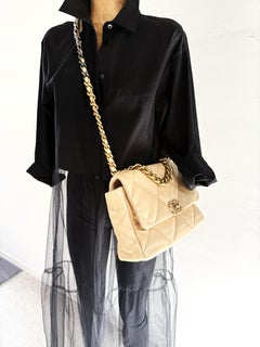 CHANEL shoulder bag, Coll. 2020, light beige leather with diamant qulting