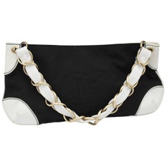 Chanel  Shoulder Bag in White Leather and Black Canvas.