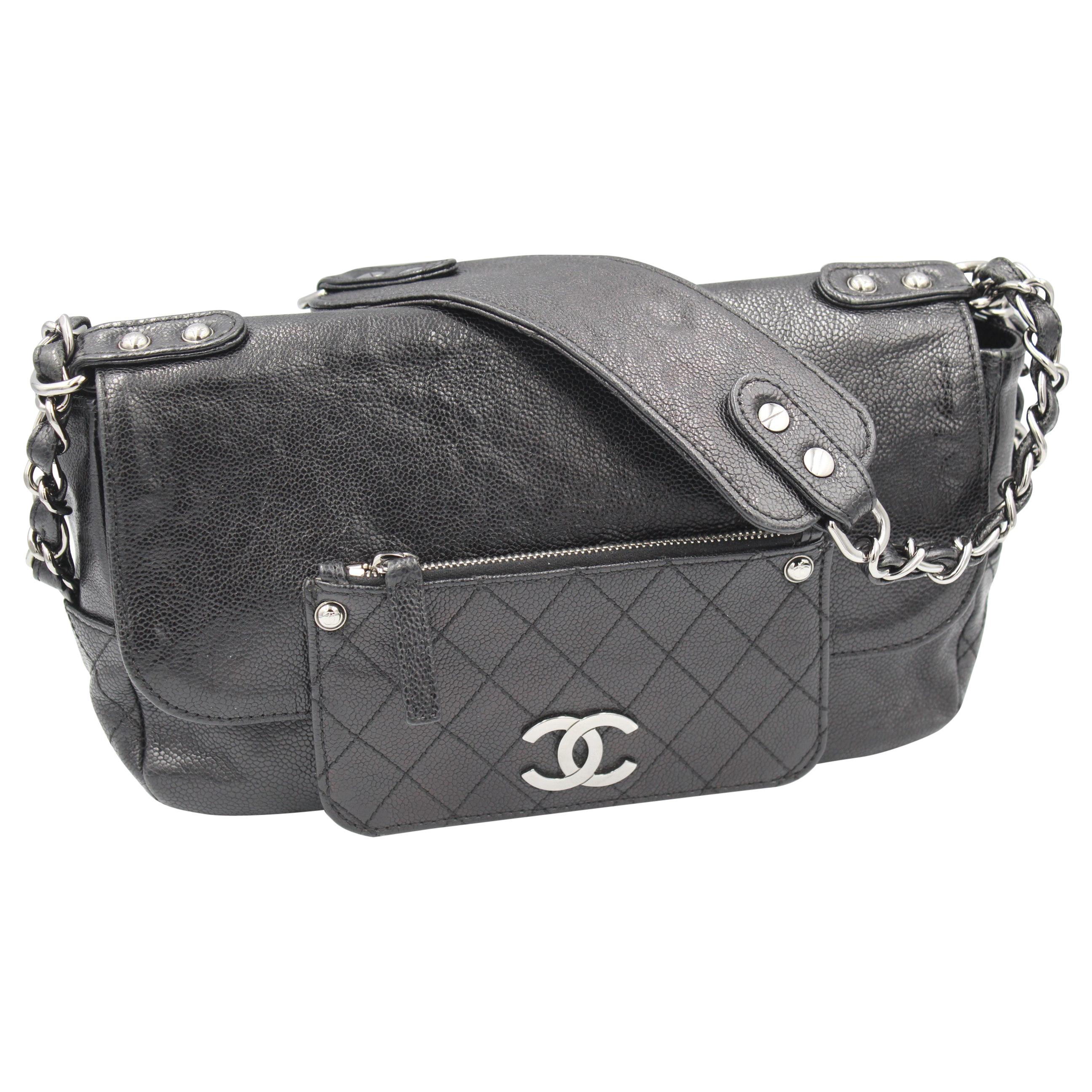 Chanel Shoulder Black Bag in Grained Leather and Silver Hardware.