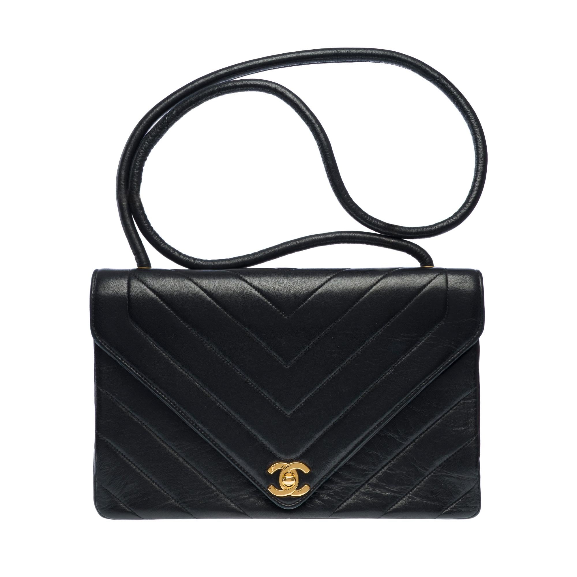 Lovely​ ​&​ ​Rare​ ​Chanel​ ​shoulder​ ​Flap​ ​bag​ ​in​ ​quilted​ ​black​ ​in​ ​black​ ​quilted​ ​chevron​ ​lambskin​ ​leather,​ ​gold-tone​ ​metal​ ​trim,​ ​a​ ​black​ ​tubular​ ​leather​ ​handle​ ​for​ ​shoulder​ ​and​ ​crossbody​ ​carry

Flap​