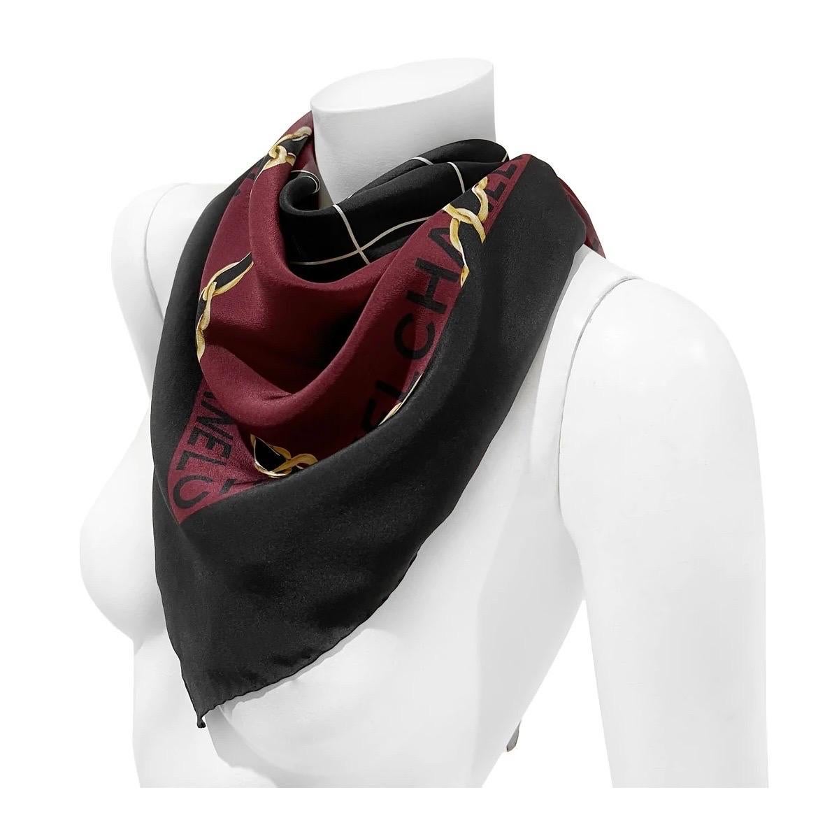 Silk 'Handbag' Print Scarf by Chanel 
Fall 2019
Made in Italy
Black/maroon 
Black handbag with gold chain print detail
Chanel logo detail around scarf
100% Silk
Excellent Condition; little to no visible use throughout scarf (see