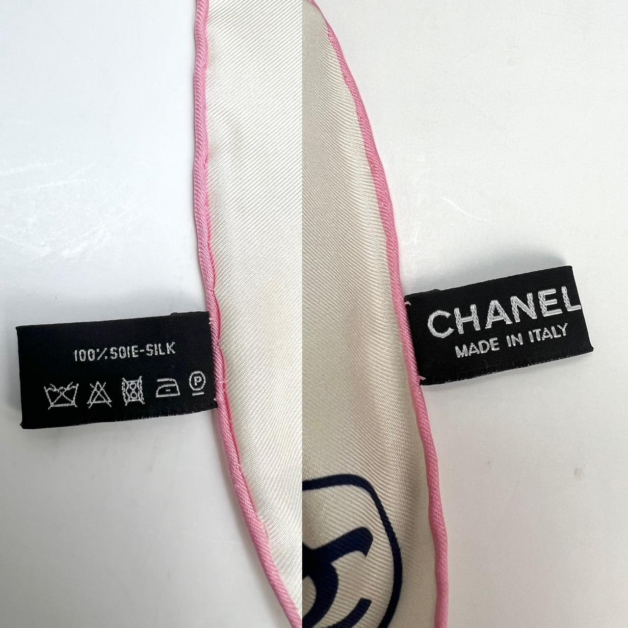 Pre-Owned  100% Authentic
Chanel Silk Pink Black Blue Scarf 
RATING: B...Very Good, well maintained, 
shows minor signs of wear
MATERIAL: 100% silk
MADE IN: Italy 
MEASUREMENTS: H 36 '' x L 36''  
INCLUDED: *Chanel box W/tissue paper
Please see all