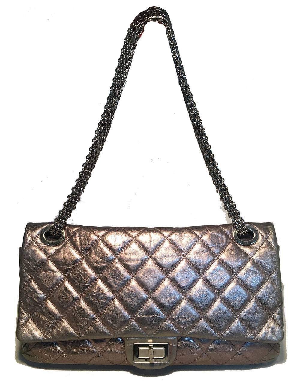 RARE Chanel Silver Aged Calfskin 228 Reissue 2.55 Double Flap Classic Shoulder Bag in excellent condition.  Gunmetal silver aged calfskin quilted exterior trimmed with silver hardware and mademoiselle twist closure.  Double flap style opening