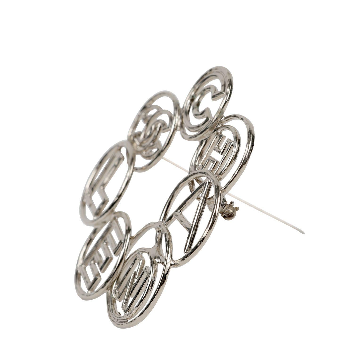Chanel Silver Bubble Letter Circle Pin In Excellent Condition For Sale In Palm Beach, FL