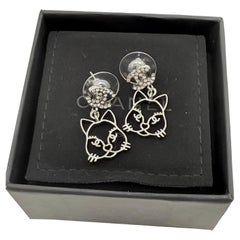 CHANEL Silver Cat Crystal CC Dangle Statement Earrings CHANEL Silver Cat Crystal CC Dangle Statement Earrings