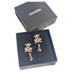CHANEL Silver CC Bow Pink Bead Drop Earrings