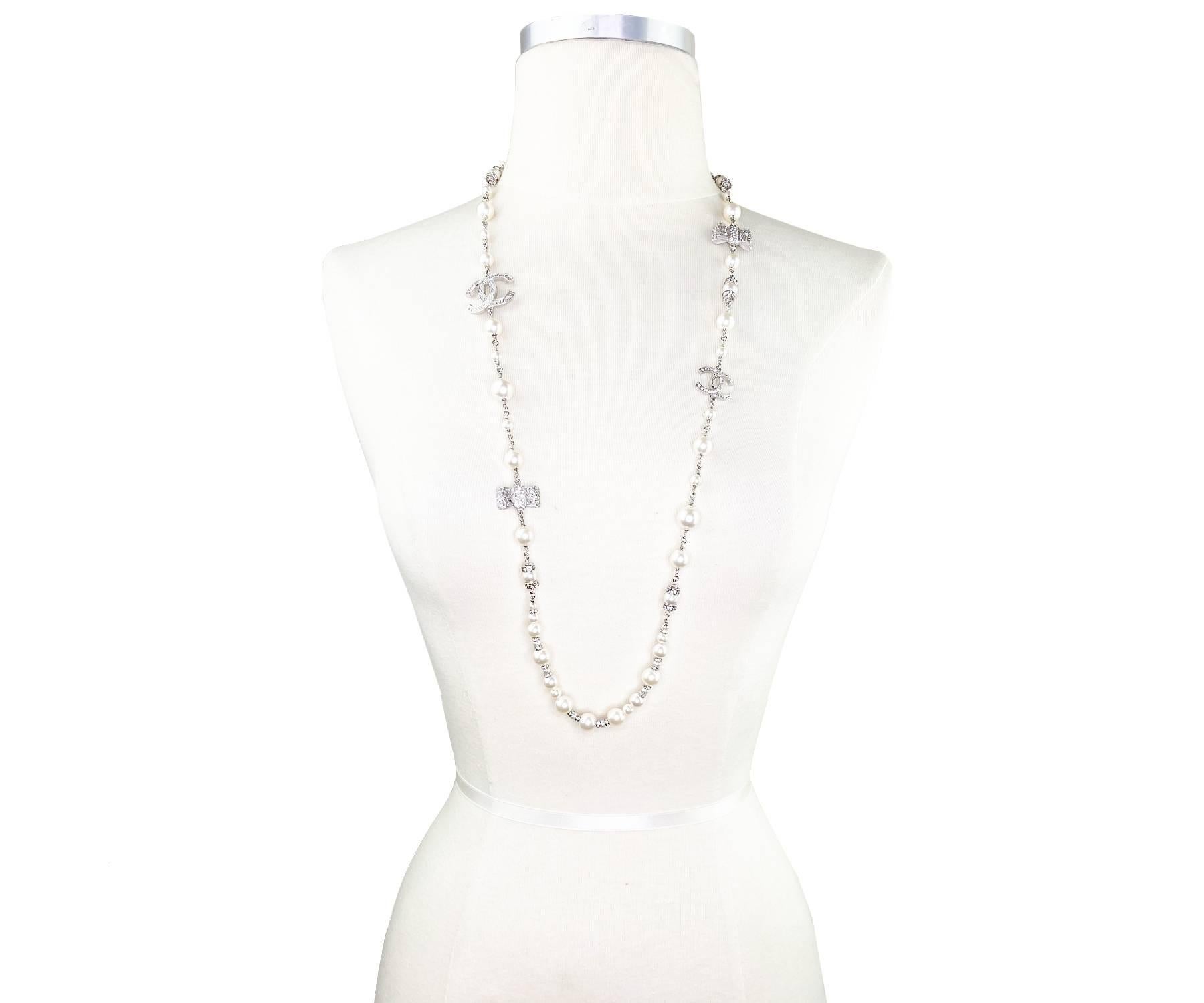 Chanel Silver CC Crystal Ribbon Bow Pearl Necklace For Sale at 1stDibs