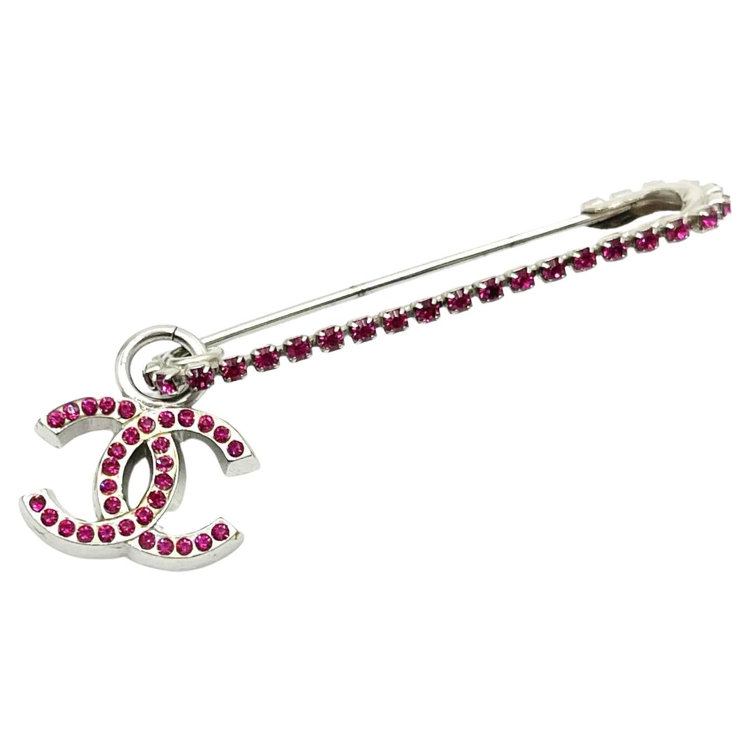 Chanel Silver CC Fuchsia Crystal Safety Pin For Sale