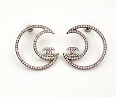 Chanel Silver CC Half Moon Crystal Piercing Earrings