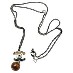 Chanel Silver CC Petrified Wood CC Dangle Pendant Necklace