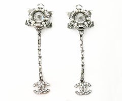 Boucles d'oreilles Pierce CC pointues en cristal flocon de neige de Chanel en argent