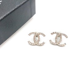 Chanel Silver CC Round Crystal Piercing Earrings