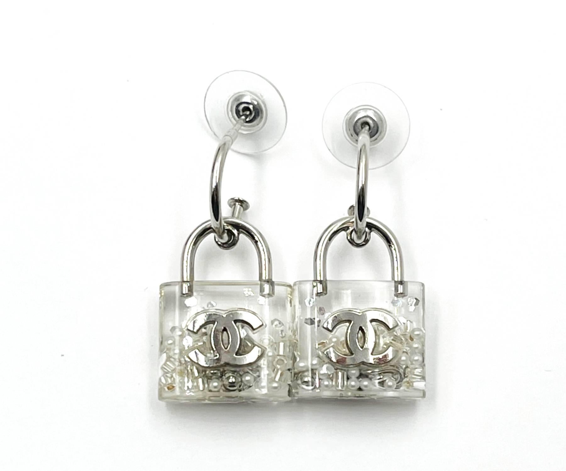Contemporary Chanel Silver CC Silver Confetti Lock Hoop Piercing Earrings