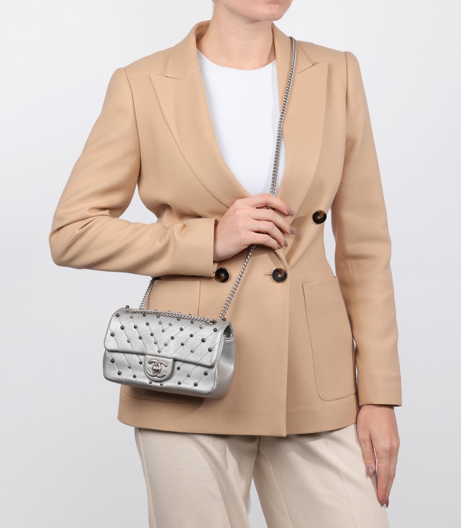 Chanel Silver Chevron Quilted Lambskin Stud Wars Rectangular Mini Flap Bag

Product Details
Xupes Ref: HB5407
Brand: Chanel
Model: Rectangular Mini Flap Bag
Type: Shoulder, Crossbody
Serial Number: 24862628
Age: 2017
Accompanied By: Chanel Dust Bag,