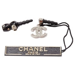 CHANEL silver crystal CC black china doll earphone jack charm x2