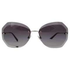 CHANEL argent et gris SPRING RIMLESS Lunettes de soleil rondes 4220