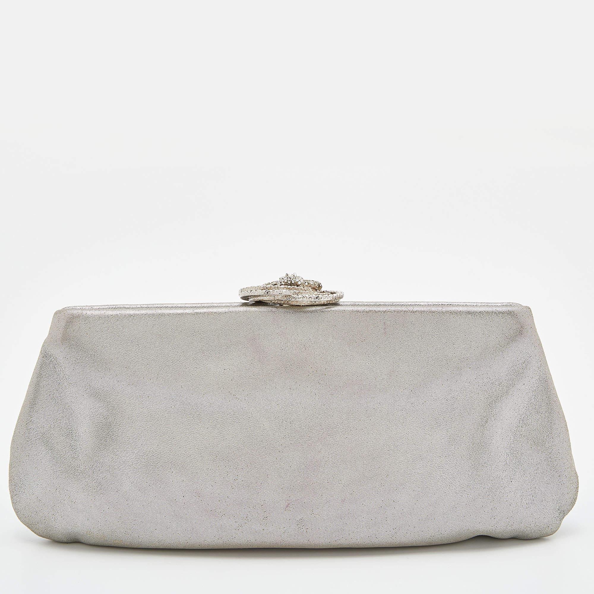 Functional and fashionable, this clutch is a classy styling choice. It is crafted from quality materials, and its lined interior will keep your evening essentials in a neat way.

Includes: Original Dustbag
