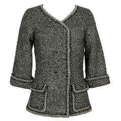 Chaqueta Chanel plateada con forro de seda