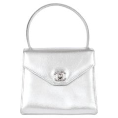 Chanel Kelly Handbag - 55 For Sale on 1stDibs  chanel kelly top handle bag,  chanel kelley, chanel mini kelly bag