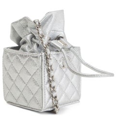 CHANEL silver leather 2021 DRAWSTRING MINI COIN Crossbody Bag