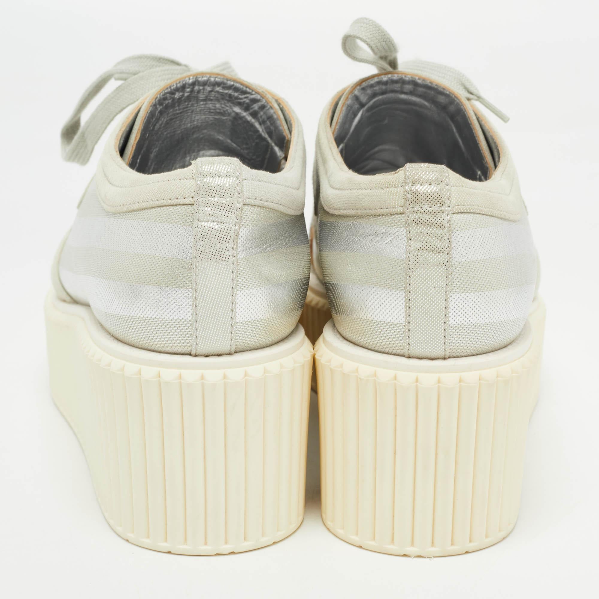 Add a statement appeal to your outfit with these sneakers. Made from premium materials, they feature lace-up vamps, and relaxing footbeds. The rubber sole of this pair aims to provide you with everyday ease.

