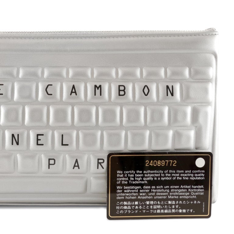 Chanel Silver Leather Keyboard Clutch at 1stDibs