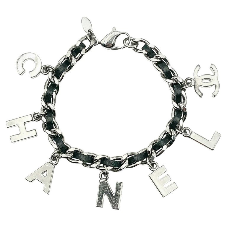 Chanel Silver and Leather Spell Out Letter Charm Bracelet 2004 at 1stDibs