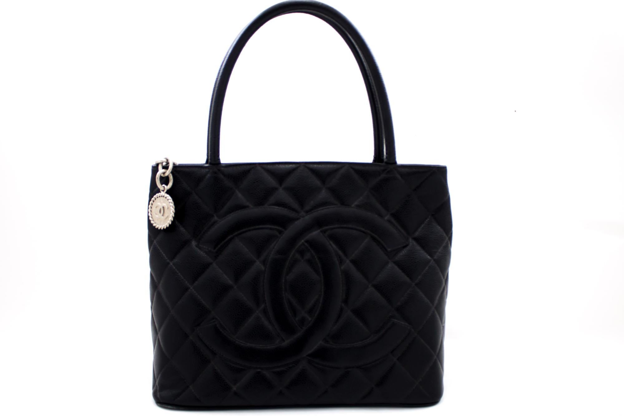 An authentic CHANEL Silver Medallion Caviar Shoulder Bag Shopping Tote Black. The color is Black. The outside material is Leather. The pattern is Solid. This item is Contemporary. The year of manufacture would be 2002.
Conditions & Ratings
Outside