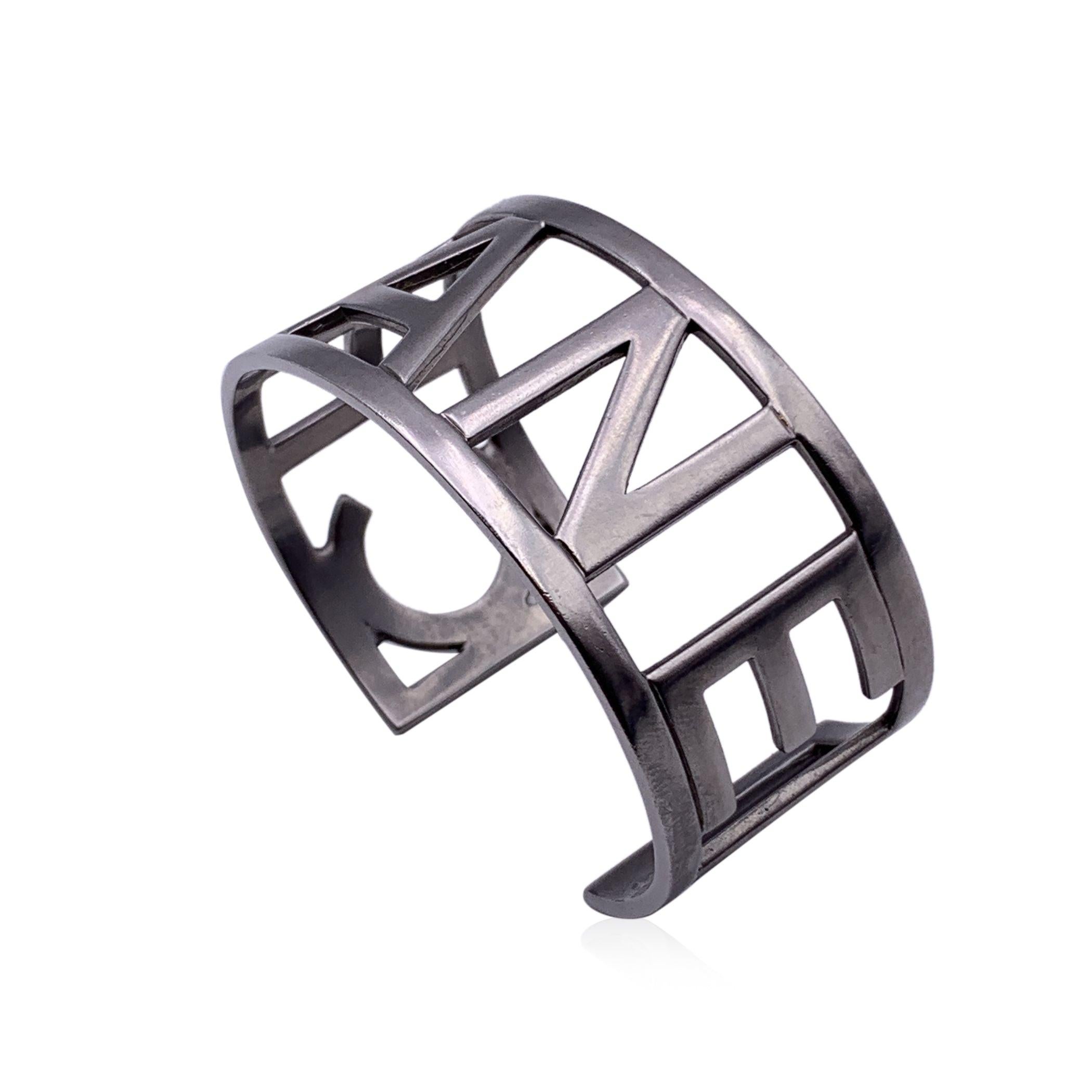 Chanel Silver Metal Logo Letter Cuff Bangle Bracelet In Excellent Condition For Sale In Rome, Rome