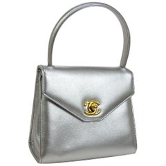 chanel silver top handle bag Chanel Silver Metallic Leather Gold Small Kelly Top Handle Satchel Bag in Box