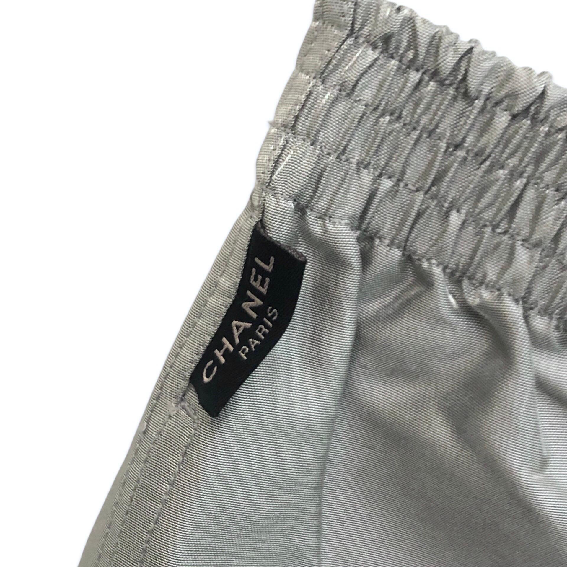 - Chanel silver metallic silk and nylon shorts from spring/summer 1999 collection.  

- Featuring two 
