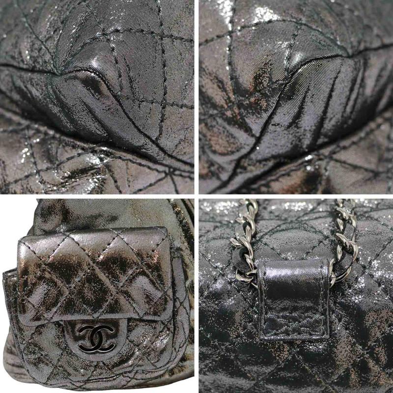 Women's or Men's Chanel Silver Mini Backpack For Sale