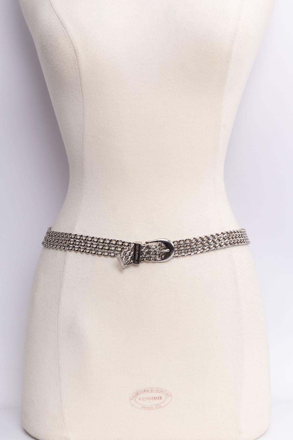Chanel (Made in France) Silver plated flexible belt. Spring-Summer 1997 collection.

Additional information: 
Dimensions: Length: 75 cm (29.53 in) x Width: 2 cm (0.79 in)
Condition: Very good condition
Seller Ref number: CCB80