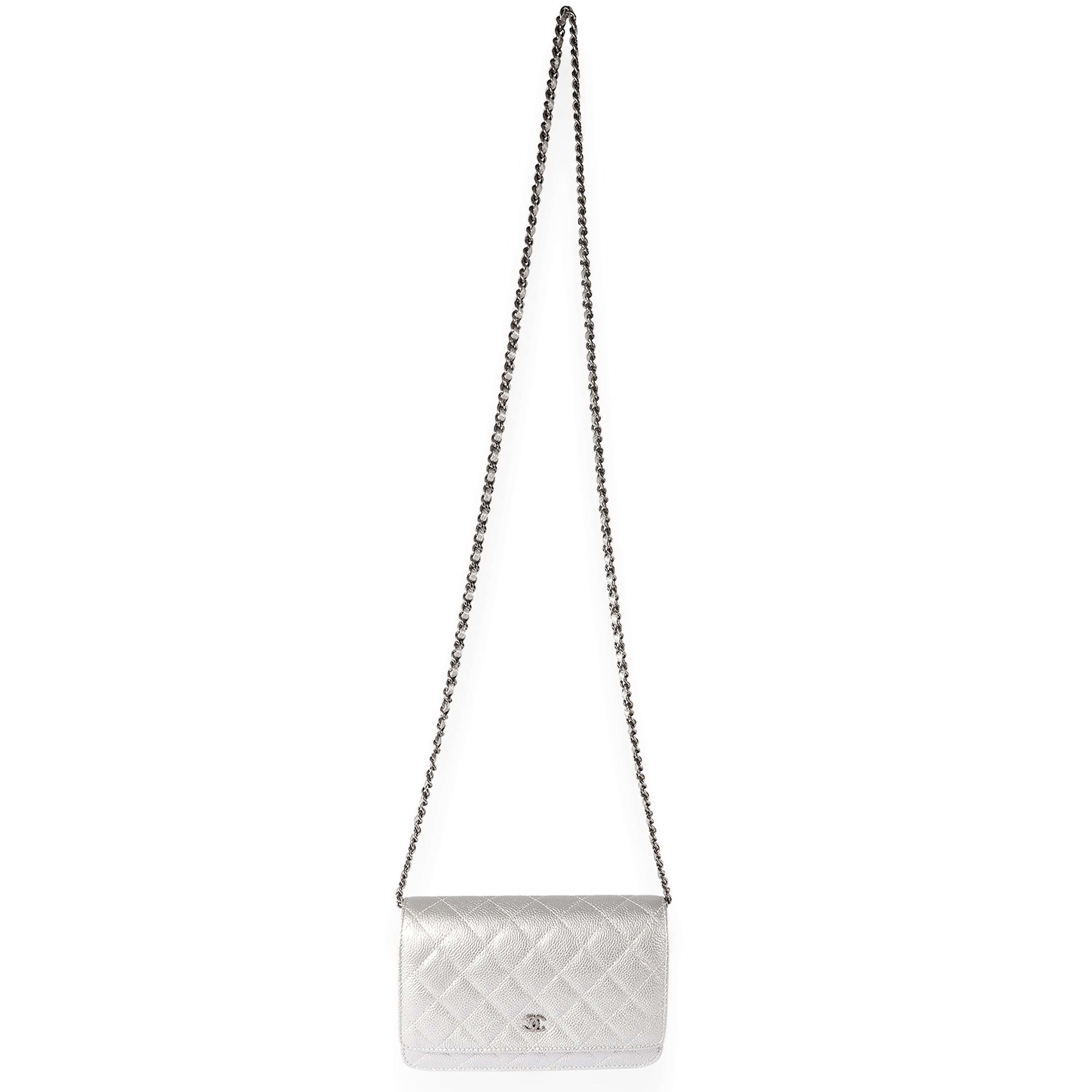 Listing Title: Chanel Silver Quilted Caviar Wallet On Chain
SKU: 122665
Condition: Pre-owned 
Handbag Condition: Mint
Condition Comments: Mint Condition. No signs of wear. Final sale.
Brand: Chanel
Model: WOC
Origin Country: Italy
Handbag