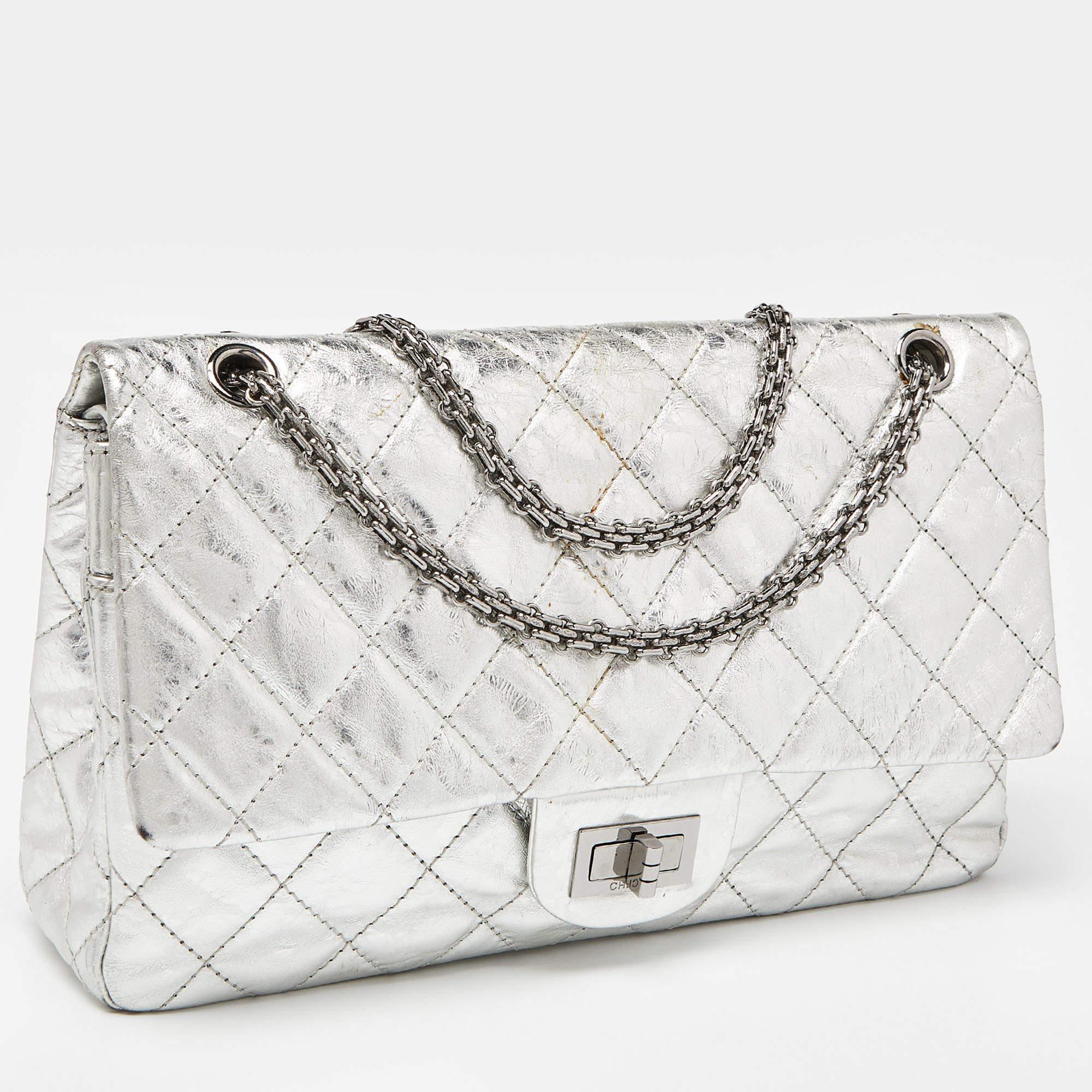 Chanel's Flap Bags are iconic and noteworthy in the history of fashion. We hence believe this Reissue 2.55 to be a wise purchase. Exquisitely crafted from crinkled leather, it bears their signature quilt pattern and the Mademoiselle lock on the